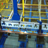 Sistema de almacenamiento automático multifuncional de materia prima de barra colectora