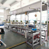 Línea de montaje semiautomática de conductos colectores para montaje compacto de carcasas de barras colectoras