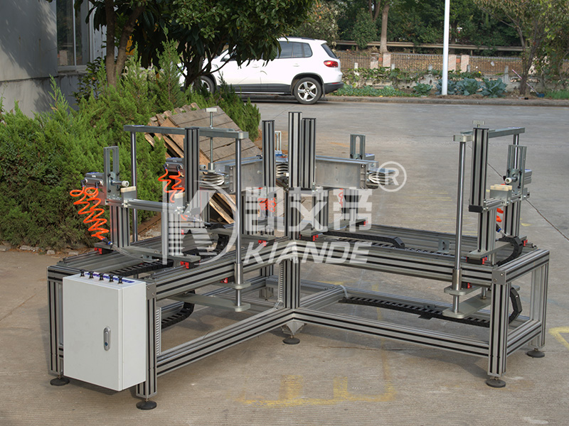 Máquina de ensamblaje de barras colectoras de codo