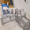 Fabricación de máquina ensambladora de barras colectoras de codos para la producción de perfiles de conductos colectores de codos.